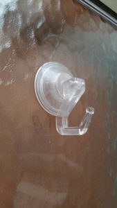 Save space in your RV without damaging walls by using suction cup hooks