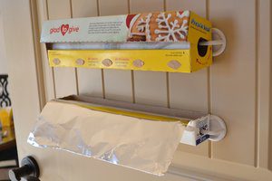 Save counter space and make it easy to get to your aluminum foil by installing hooks on the wall!