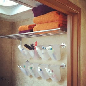 Store toiletries using hanging containers from Ikea!