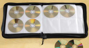 RV space saving ideas: Store your DVDs and CDs in a binder!