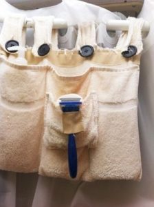 Save space in your RV shower by making a caddy out of towels!