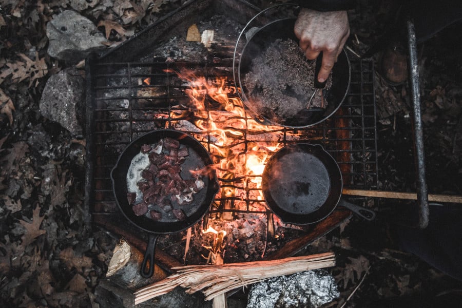 Cooking over campfire Cooking over campfire