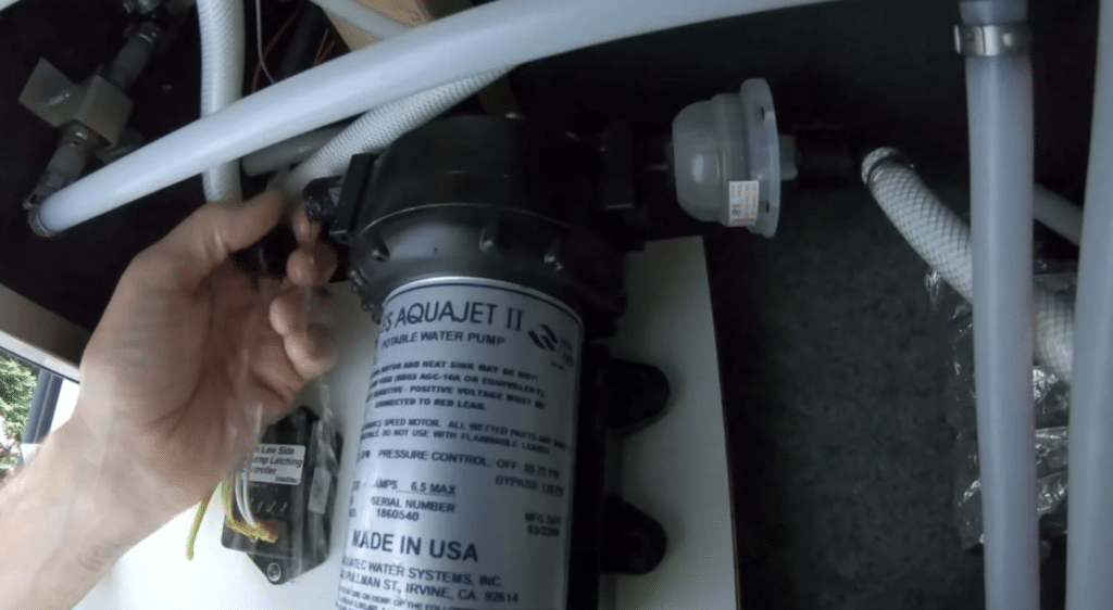 remove inlet and outlet lines from pump