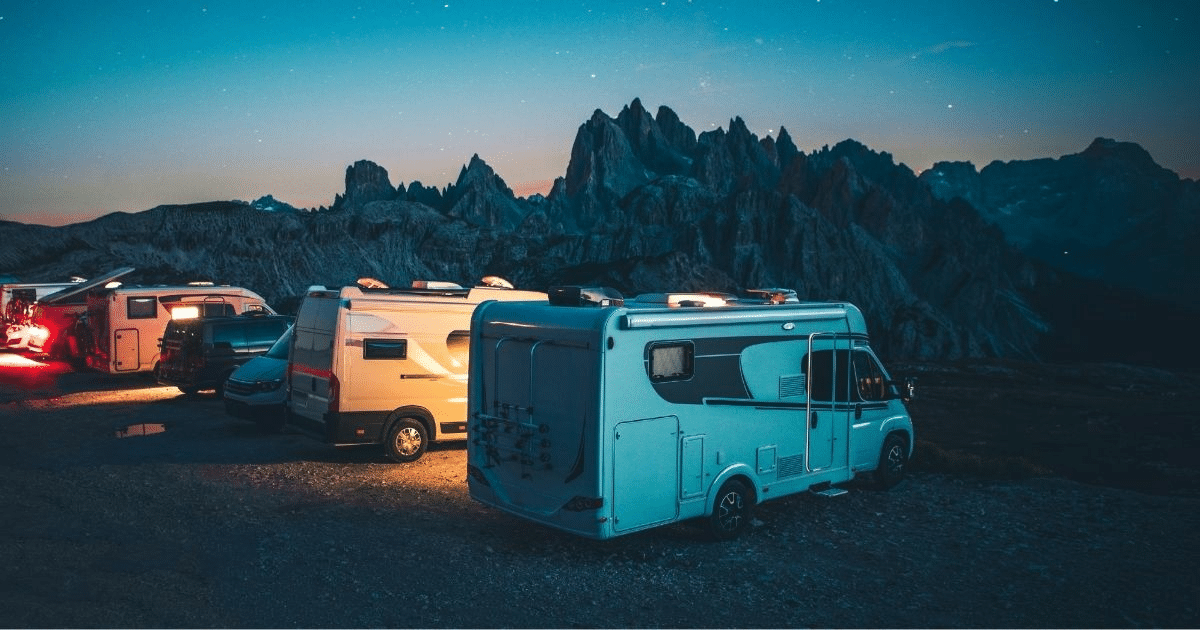 Vans parked at campground